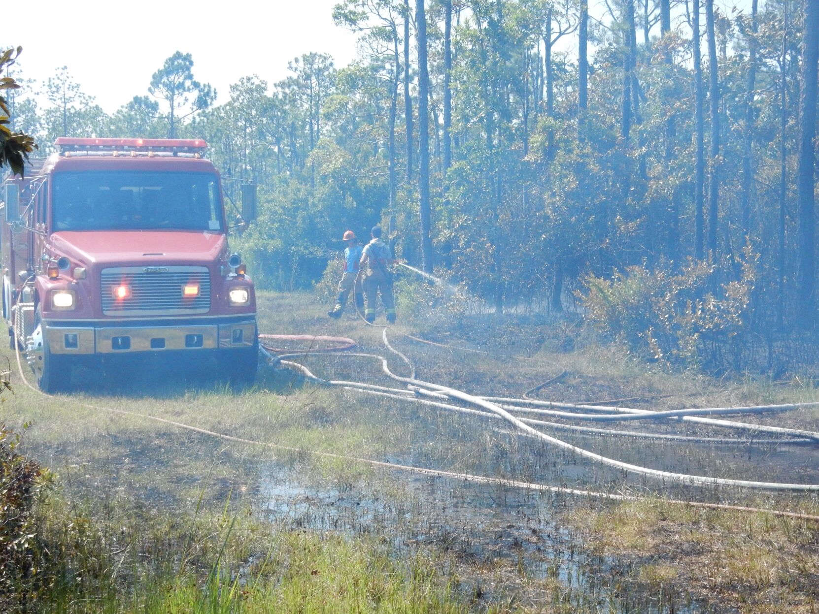Firefighters quench brush fire near Newport
